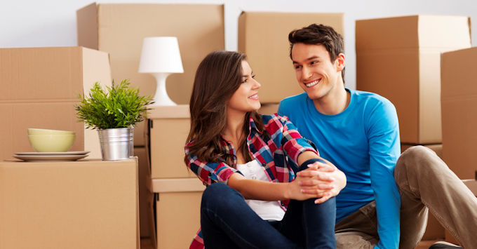young couple in their new apartment