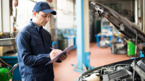 Mechanic writing an estimate