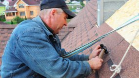 Roofing contractor working on a roof