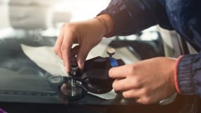 Windshield being replaced